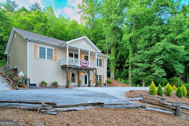 view of front of property with a balcony