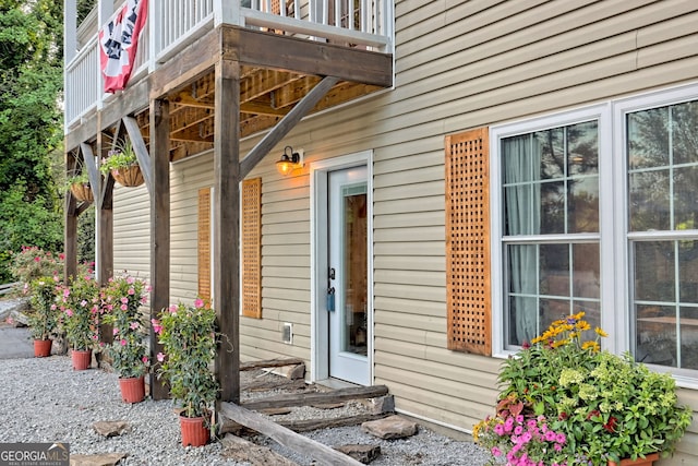 property entrance with a balcony