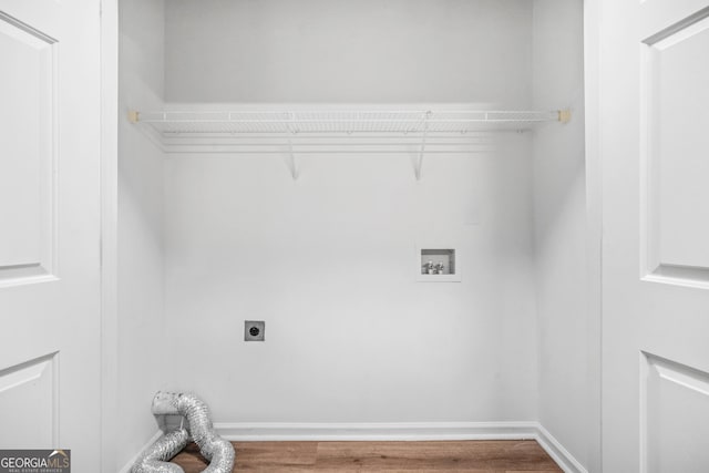 washroom featuring hookup for an electric dryer, washer hookup, and hardwood / wood-style floors