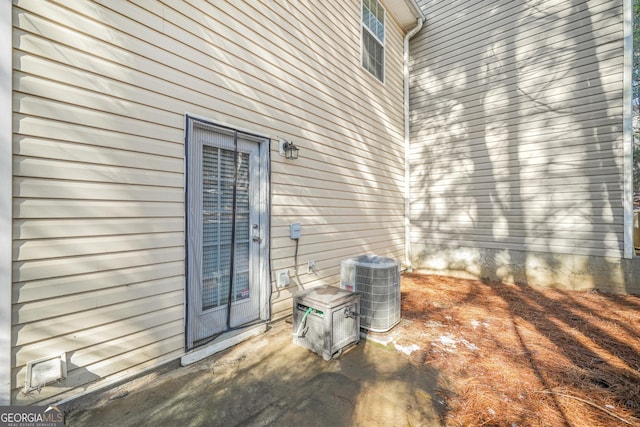 view of patio with central AC unit