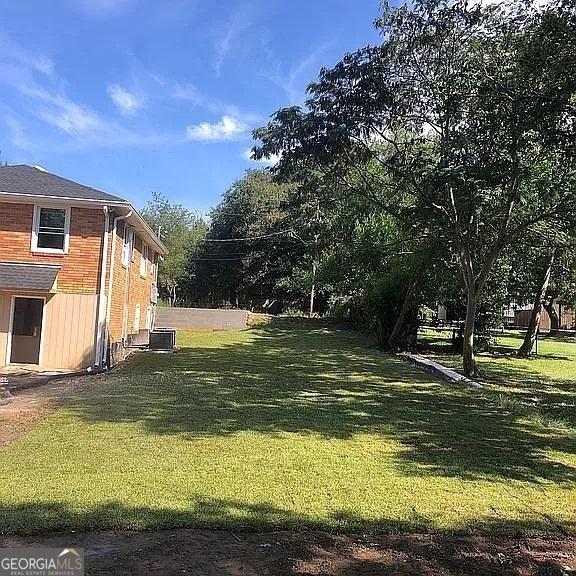 exterior space with a lawn