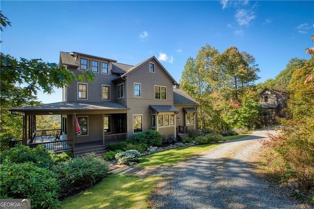 view of front of property featuring covered porch