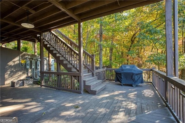wooden deck with grilling area