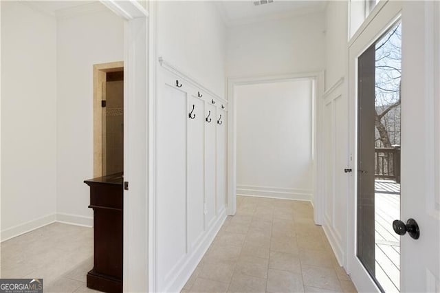 mudroom with crown molding