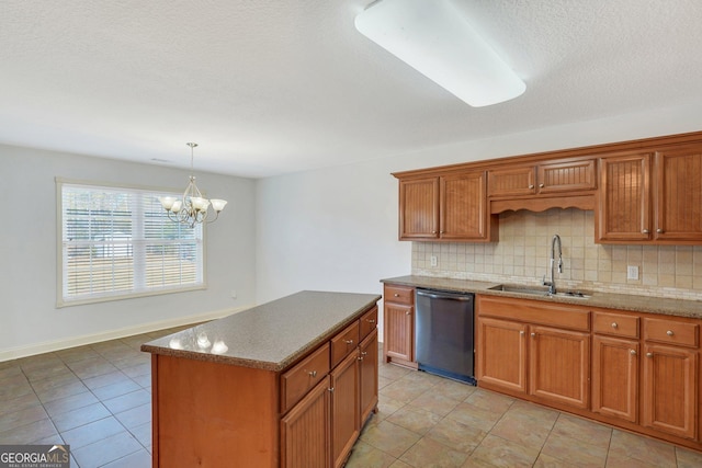 kitchen with sink, hanging light fixtures, stainless steel dishwasher, a notable chandelier, and a kitchen island