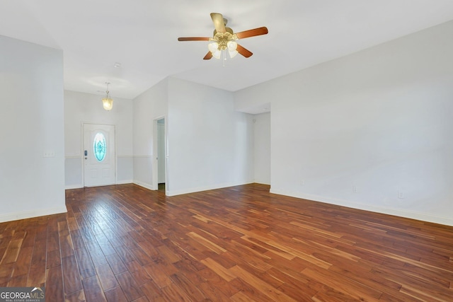 interior space featuring dark hardwood / wood-style flooring and ceiling fan