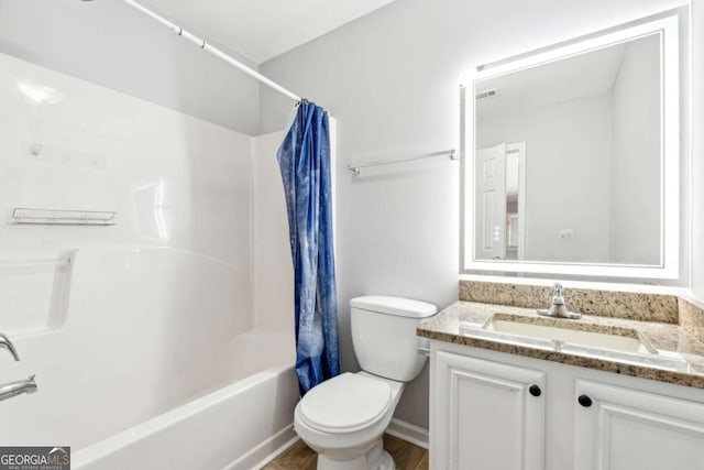 full bathroom featuring vanity, toilet, and shower / bathtub combination with curtain