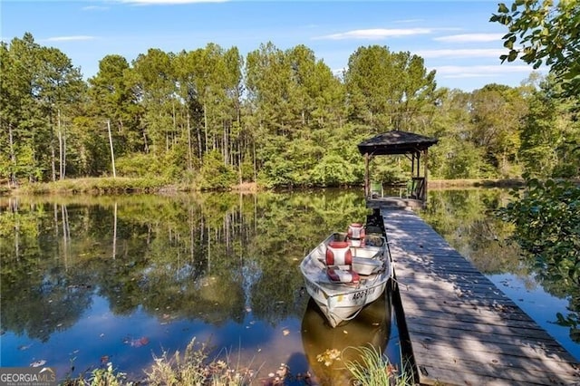 dock area featuring a gazebo and a water view