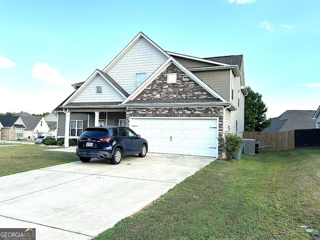 view of front of home featuring central AC, a front lawn, and a garage