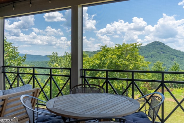 balcony featuring a mountain view