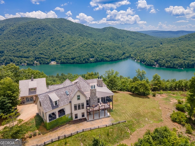 aerial view with a water and mountain view