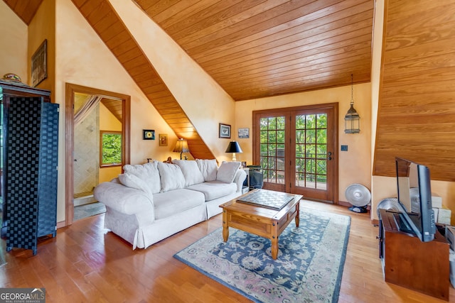 living room featuring french doors, hardwood / wood-style flooring, vaulted ceiling, and wood ceiling