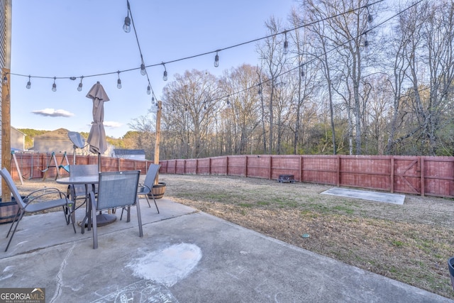 view of patio / terrace with a fenced backyard and outdoor dining space