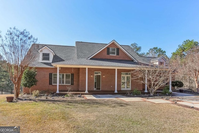 view of front of home with a front yard