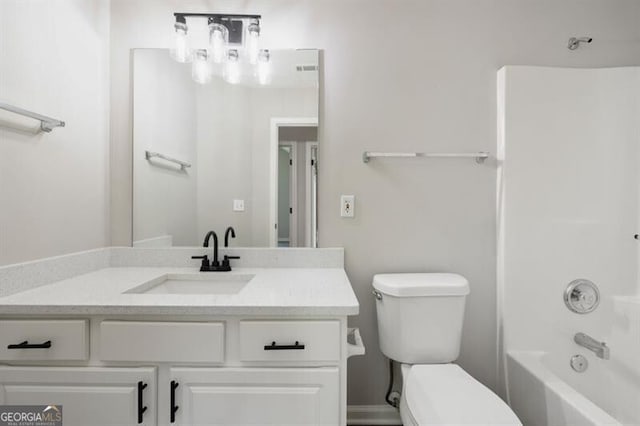 full bathroom with vanity, bathing tub / shower combination, and toilet