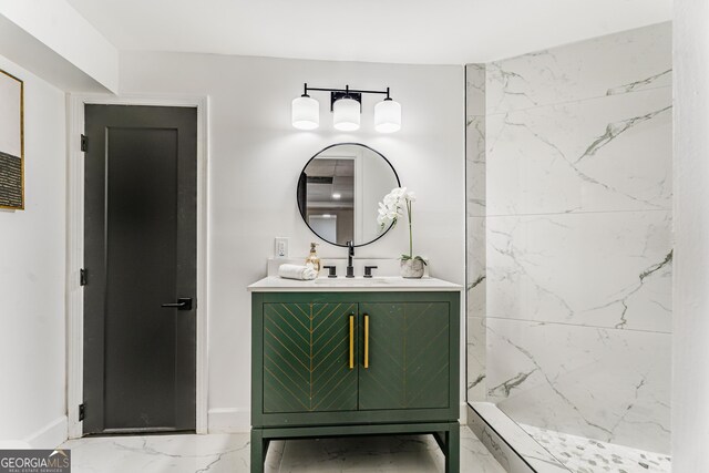 bathroom with vanity and a shower