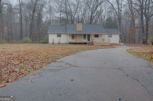 ranch-style home with covered porch