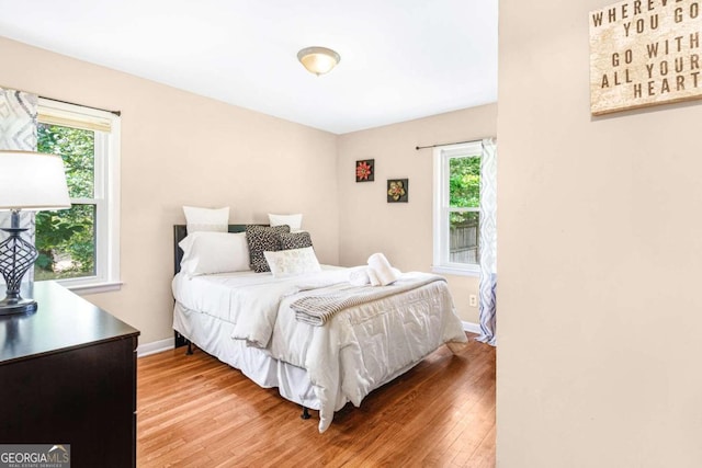 bedroom featuring hardwood / wood-style flooring