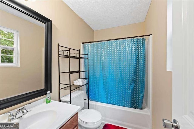 full bathroom with vanity, toilet, shower / bathtub combination with curtain, and a textured ceiling