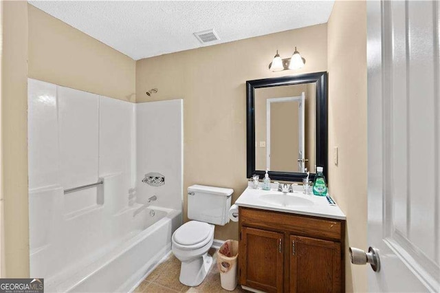 full bathroom with tile patterned floors, a textured ceiling, toilet, shower / tub combination, and vanity