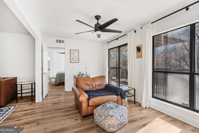 kitchen featuring white cabinets, light hardwood / wood-style floors, sink, and appliances with stainless steel finishes