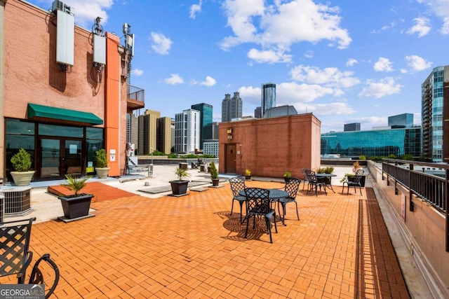 view of patio with cooling unit