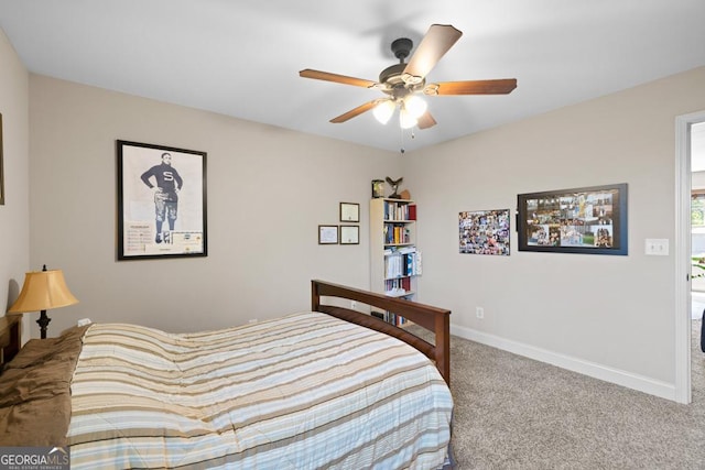 carpeted bedroom featuring ceiling fan