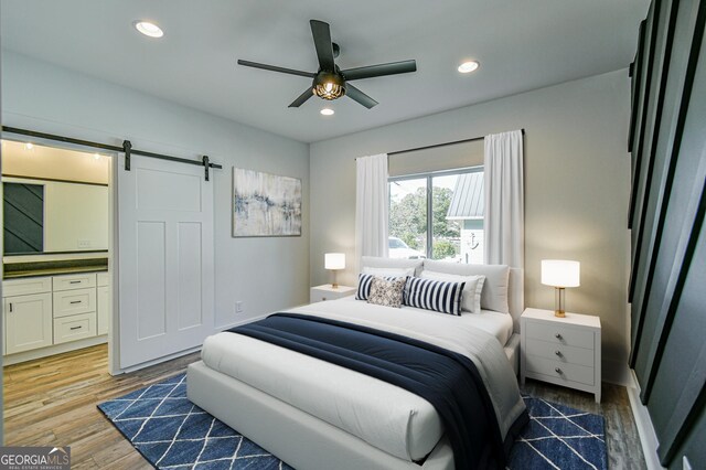 wooden deck featuring a sunroom and ceiling fan