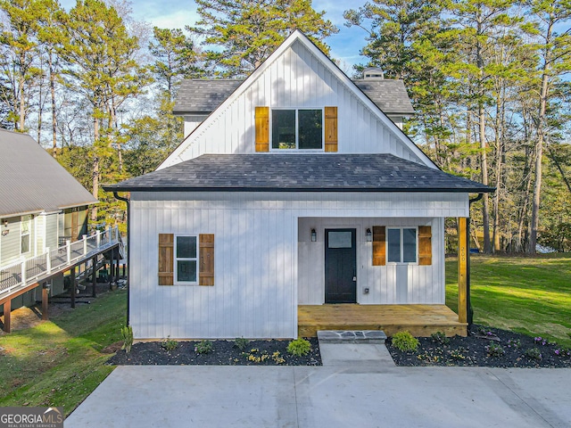 view of outbuilding with a lawn