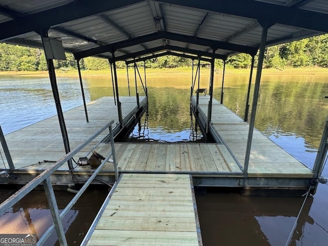 view of dock with a water view