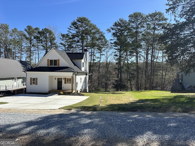 200 Greenpeace Way, Martin, GA 30557 - modern farmhouse style home with driveway, a chimney, a front yard, and central air condition unit