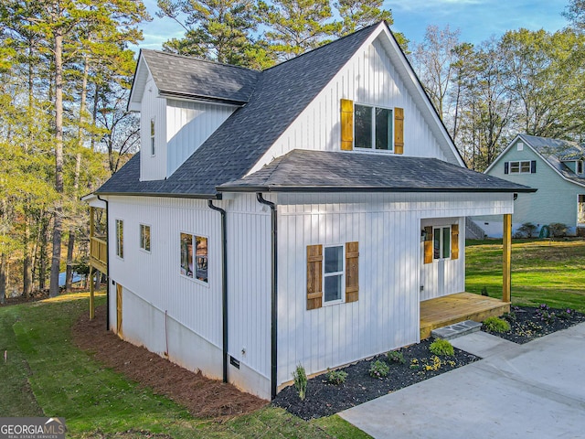 view of property exterior with a lawn