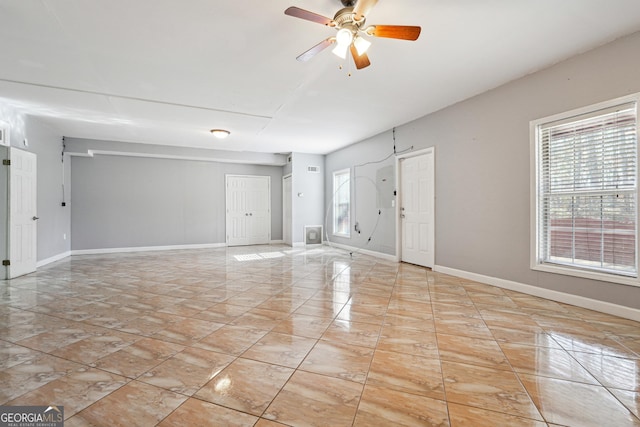 spare room with ceiling fan