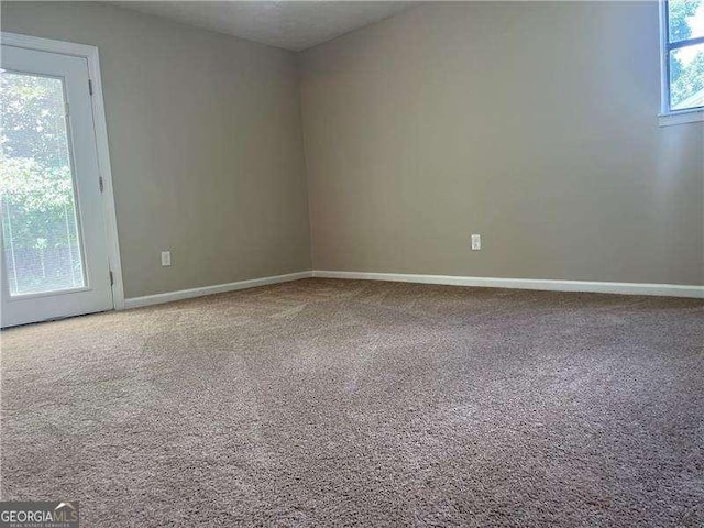 view of carpeted spare room