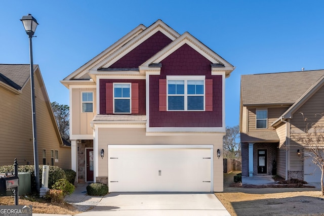 view of front of property featuring a garage