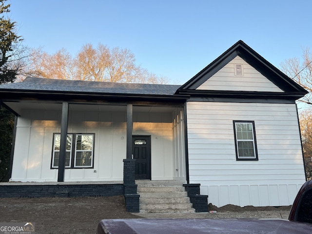 view of front of home featuring covered porch