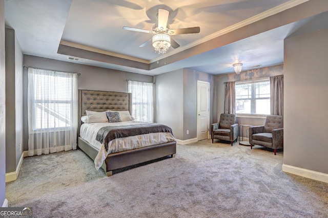 bedroom with carpet, a raised ceiling, visible vents, and baseboards