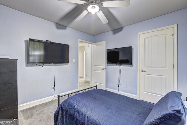 bedroom featuring ceiling fan, baseboards, and carpet flooring