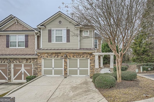 view of front of home with a garage