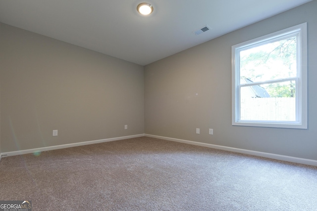 view of carpeted spare room