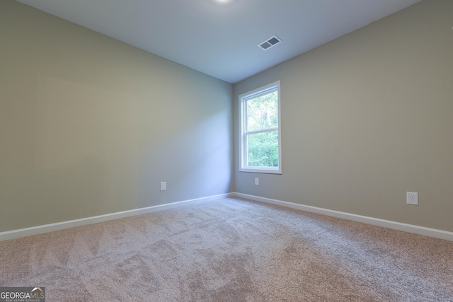 view of carpeted spare room