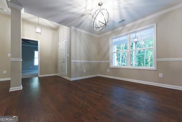 interior space featuring crown molding, dark wood-type flooring, and a chandelier