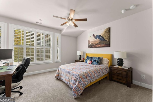 bedroom featuring multiple windows, carpet, ceiling fan, and lofted ceiling