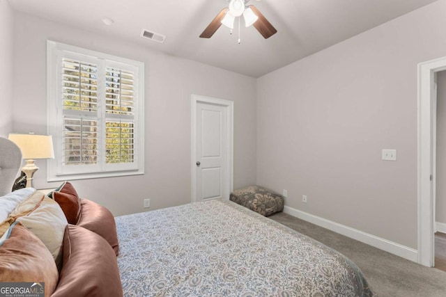 bedroom with carpet flooring and ceiling fan