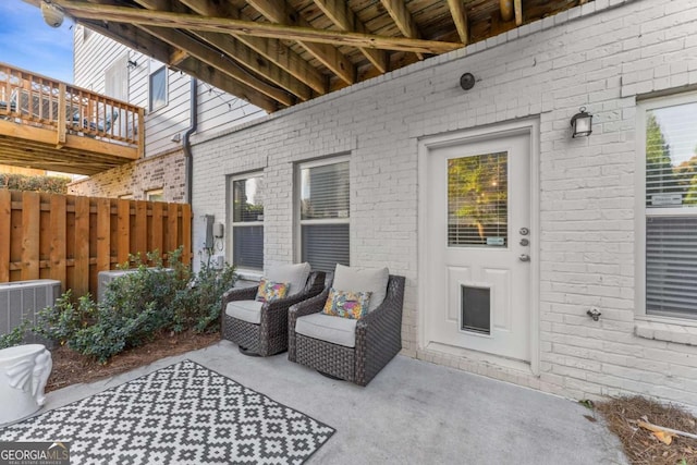 view of patio / terrace featuring central AC and a deck