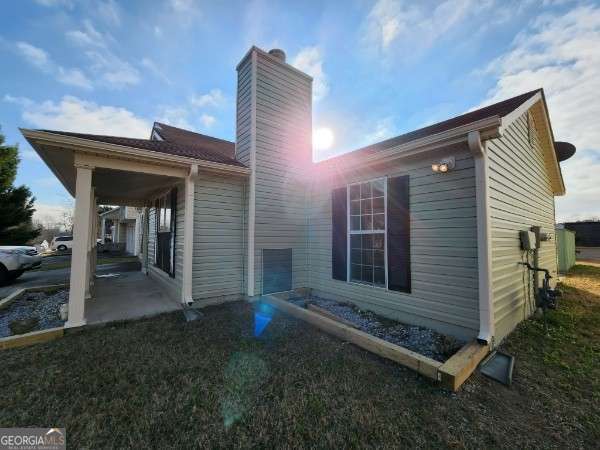 back of house featuring a patio