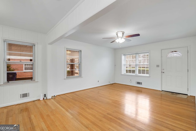 interior space with light hardwood / wood-style flooring and ceiling fan