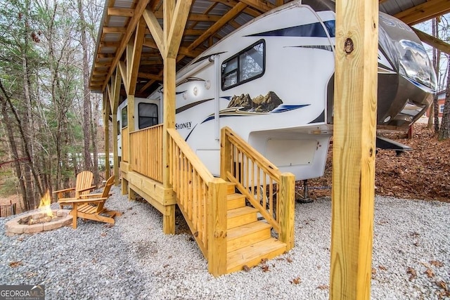 deck featuring a fire pit