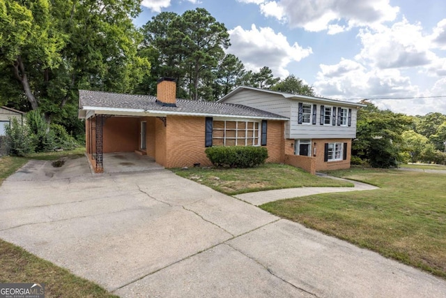 split level home with a carport and a front yard