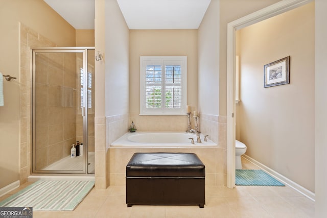 bathroom featuring tile patterned floors, independent shower and bath, and toilet